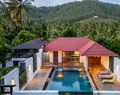 Maayaa Hillside Villas & Resorts in Anaikatti surrounded by lush green hills, ideal for family holidays and group stays.
