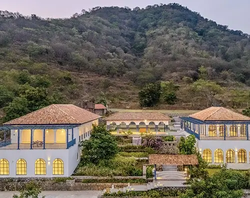 Maayaa Hillside Resort in Anaikatti surrounded by lush green hills, ideal for family holidays and group stays.