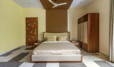 Willow Suite bedroom offering comfort and privacy at Punya Farms.